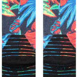 Stance Kids Bomin Snow Crew Sock 2024 - A pair of crew socks with a colorful, abstract design featuring red and blue shapes on a black background.