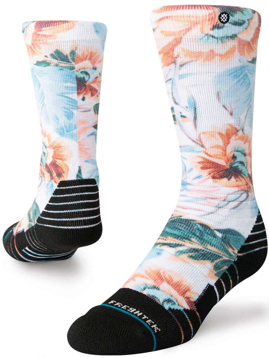 Stance Kids Flowerful Snow Sock 2024 - A pair of snow socks with a colorful floral pattern on a white background.