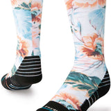 Stance Kids Flowerful Snow Sock 2024 - A pair of snow socks with a colorful floral pattern on a white background.
