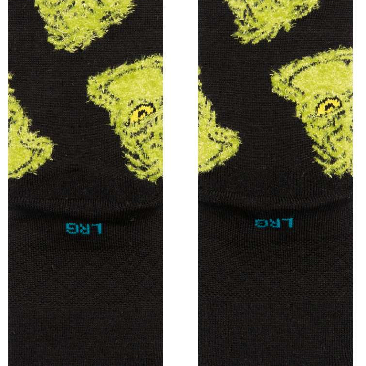 Stance Kids Mean One Crew Sock 2024 - A pair of black crew socks with a cartoonish green monster face on them.