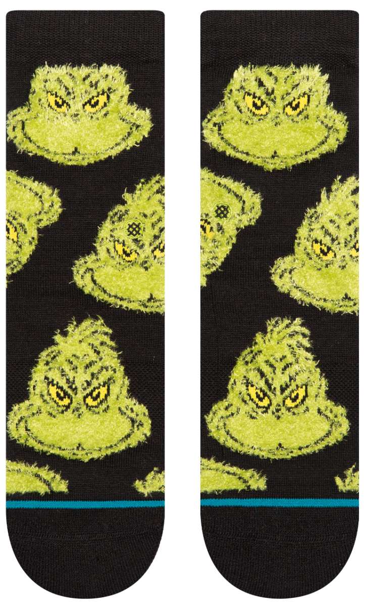 Stance Kids Mean One Crew Sock 2024 - A pair of crew socks with a cartoonish mean-looking green creature face design on them.