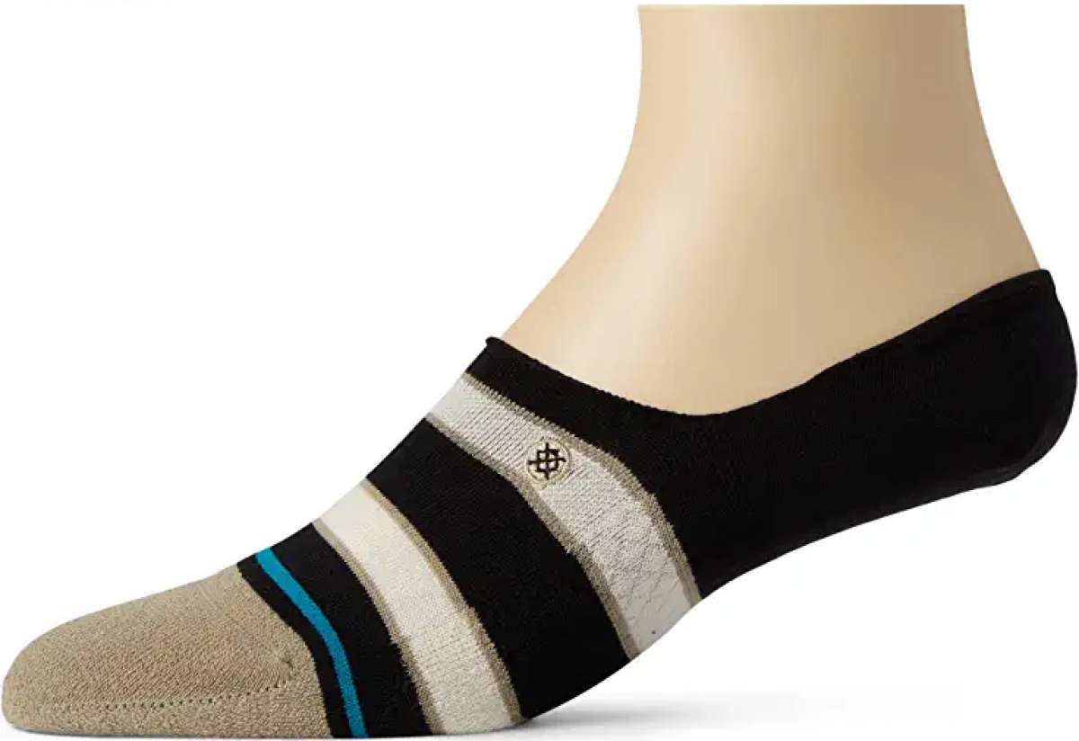 Stance Ladies Canny No Show Sock 2023 - A pair of no-show socks with a black and white striped pattern on top, featuring a blue stripe at the toe.