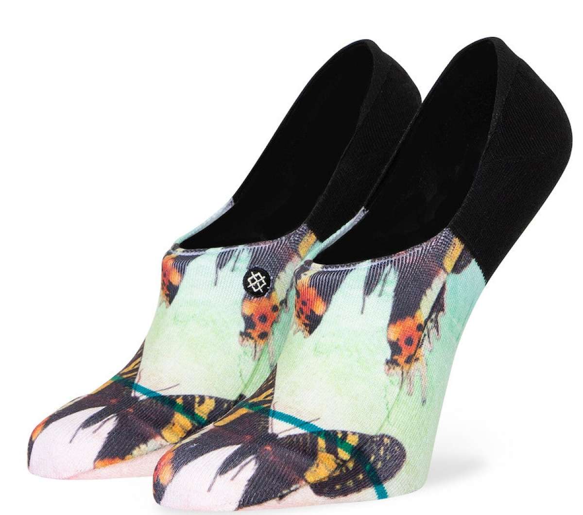 Stance Ladies' No Show Aflutter 2023 - Colorful butterfly pattern on a light green background with black trim at top and toe.