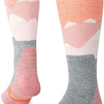 Stance Lonely Peaks Snow Sock 2024 - A pair of snow socks with a pink and grey color scheme, featuring a mountain range design on the top portion.