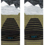 Stance - Lonely peaks design with snow-capped mountains in shades of white and gray on a green background.