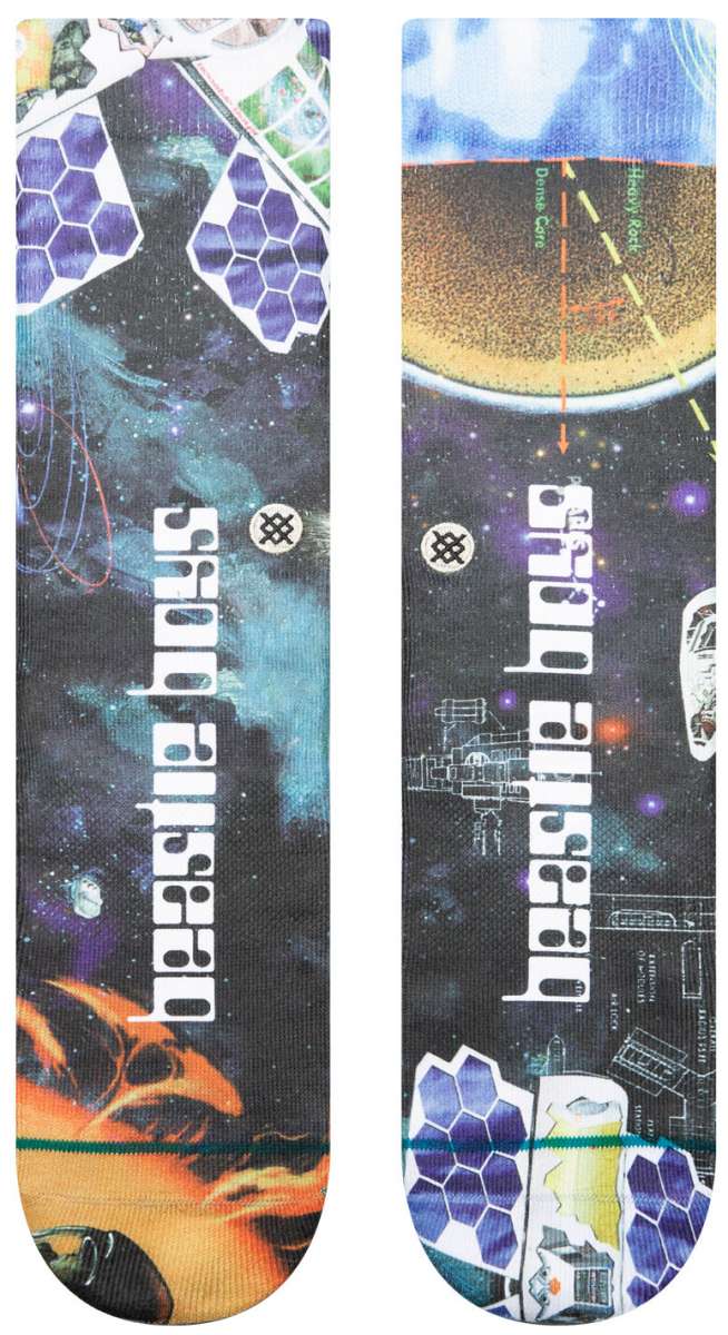 Stance M485A Crew Sock 2024 - Black crew socks with a repeating pattern of purple and green geometric shapes.