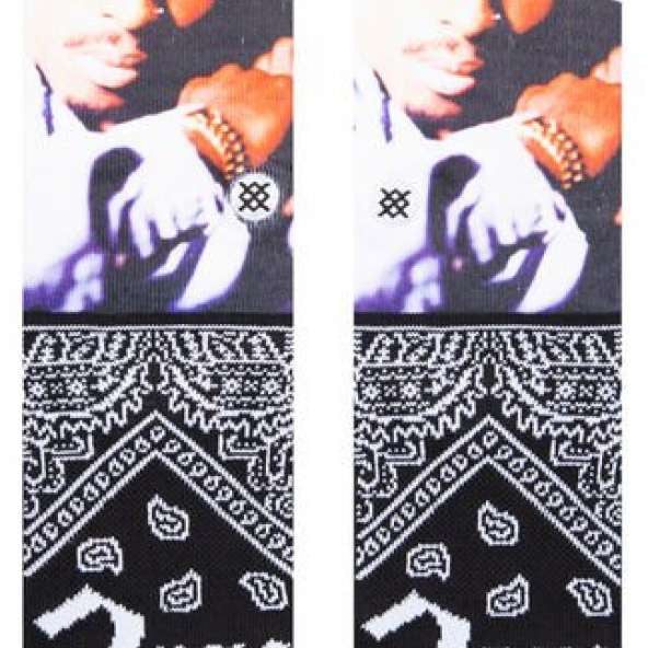 Stance Makaveli Crew Sock 2023 - A pair of crew socks featuring a portrait of Tupac Shakur wearing a purple bandana and white shirt.