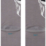 Stance Mando Crew Socks 2023 - A pair of gray crew socks with a white Mandalorian helmet graphic on the front.
