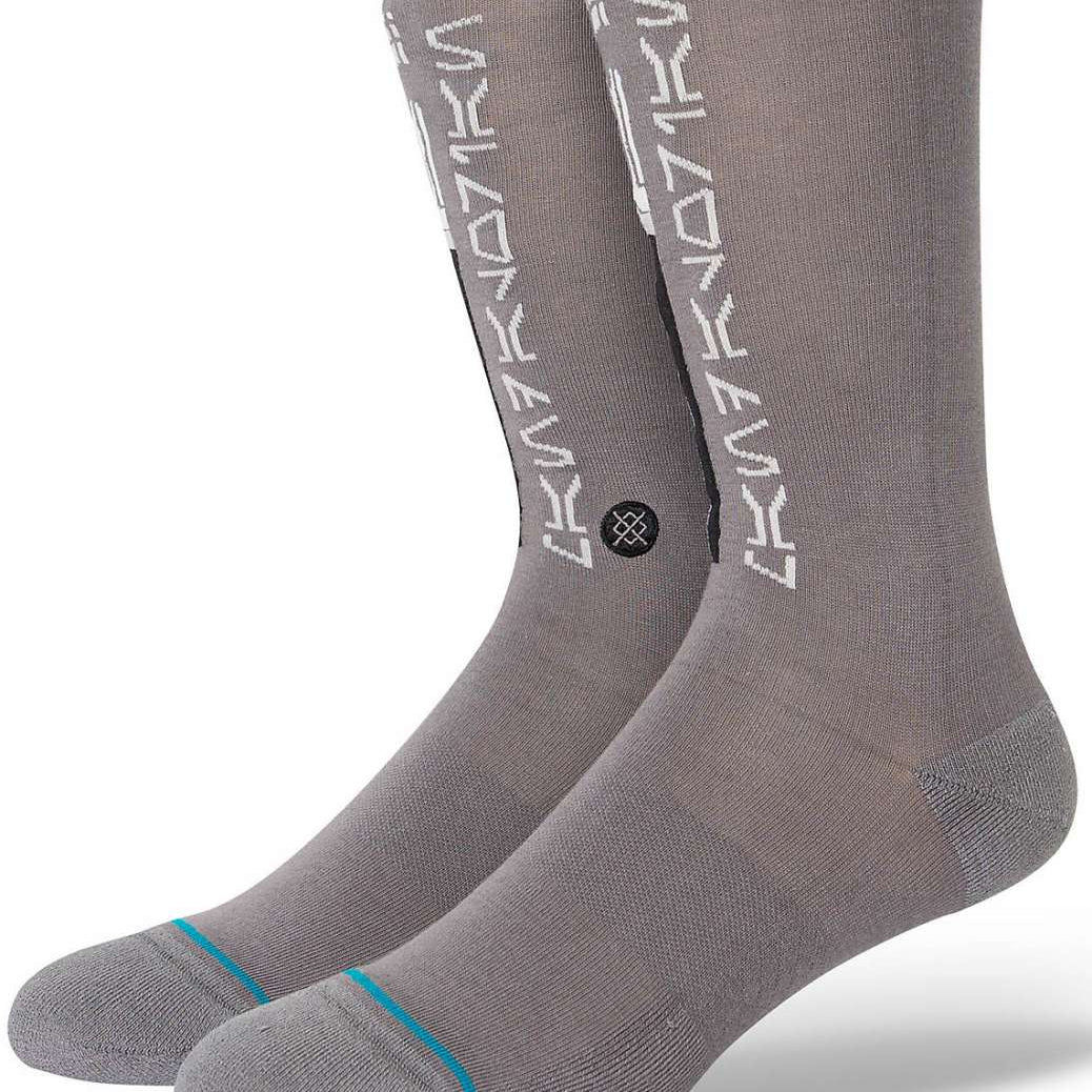 Stance Mando Crew Socks 2023 - Gray crew socks with white logo on top and blue stripe at toe.