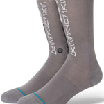 Stance Mando Crew Socks 2023 - Gray crew socks with white logo on top and blue stripe at toe.