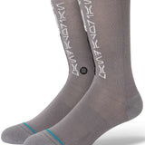 Stance Mando Crew Socks 2023 - Gray crew socks with white logo on top and blue stripe at toe.