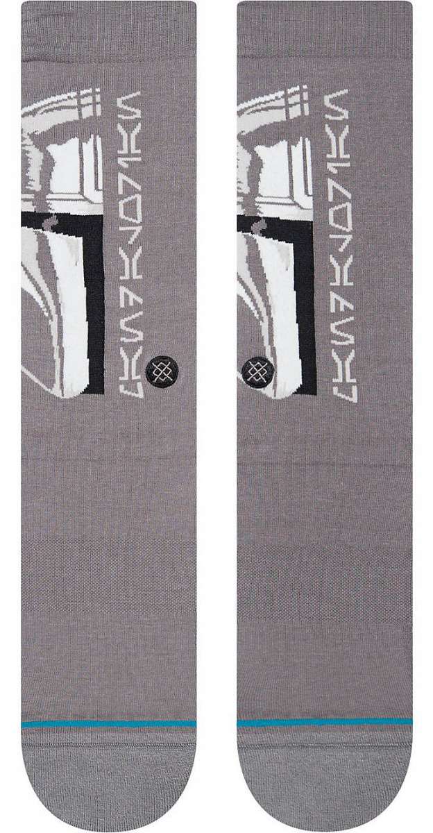Stance Mando Crew Socks 2023 - A pair of gray crew socks with a white Mandalorian helmet graphic on the top portion.