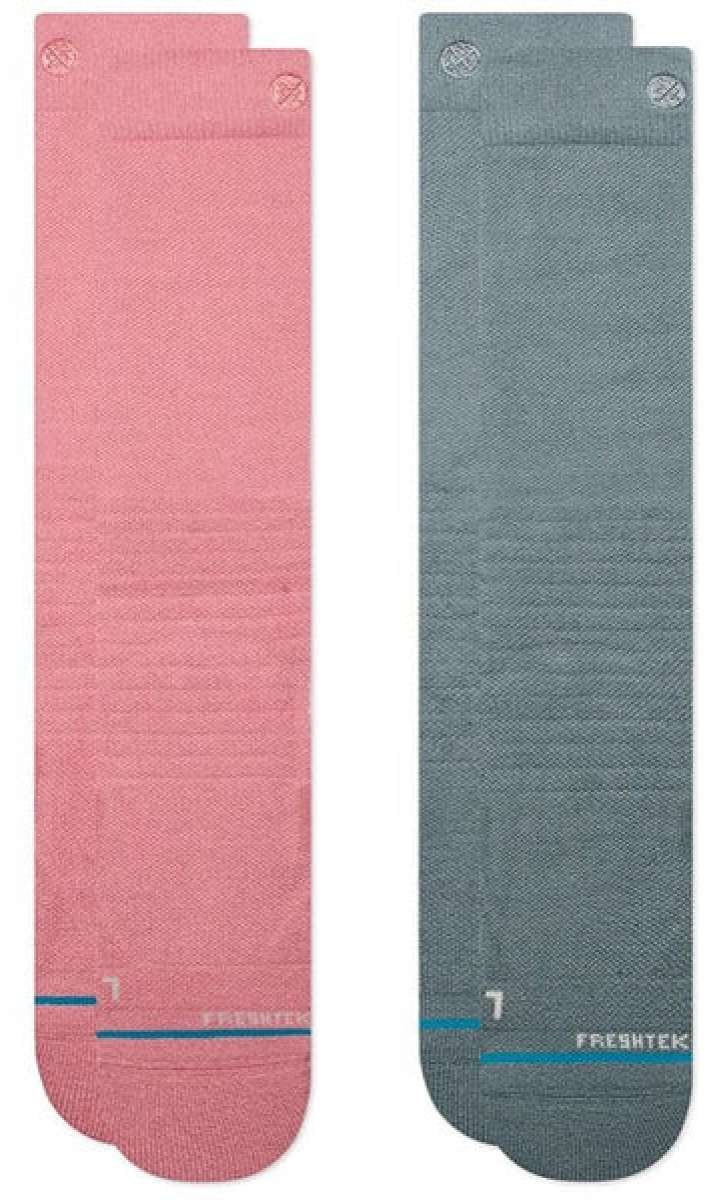 Stance Mellowed Snow 2 Pack Snow Sock 2023 - A pair of pink snow socks with a subtle pattern and a small logo on the top.