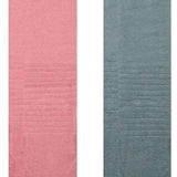 Stance Mellowed Snow 2 Pack Snow Sock 2023 - A pair of pink snow socks with a subtle pattern and a small logo on the top.