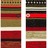 Stance Merry Merry Crew Sock 2024 - Red snowflakes on a green background with white trim and black dots.