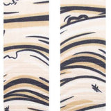 Stance Mummy T Snow Sb Sock 2024 - A pair of socks with a mummy design, featuring tan and black stripes on a white background.