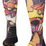 Stance Mushies Snow Sock 2023 - A pair of snow socks with a colorful, cartoon-style mushroom design in shades of pink, orange, and yellow on a white background.