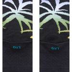 Stance Palmer Crew Sock 2023 - Black crew socks with a palm tree design in shades of green and purple.