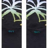 Stance Palmer Crew Sock 2023 - Black crew socks with a palm tree design in shades of green and purple.