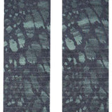 Stance Reptillious Snow Sock 2024 - A pair of gray snow socks with a reptilian pattern and black toes.