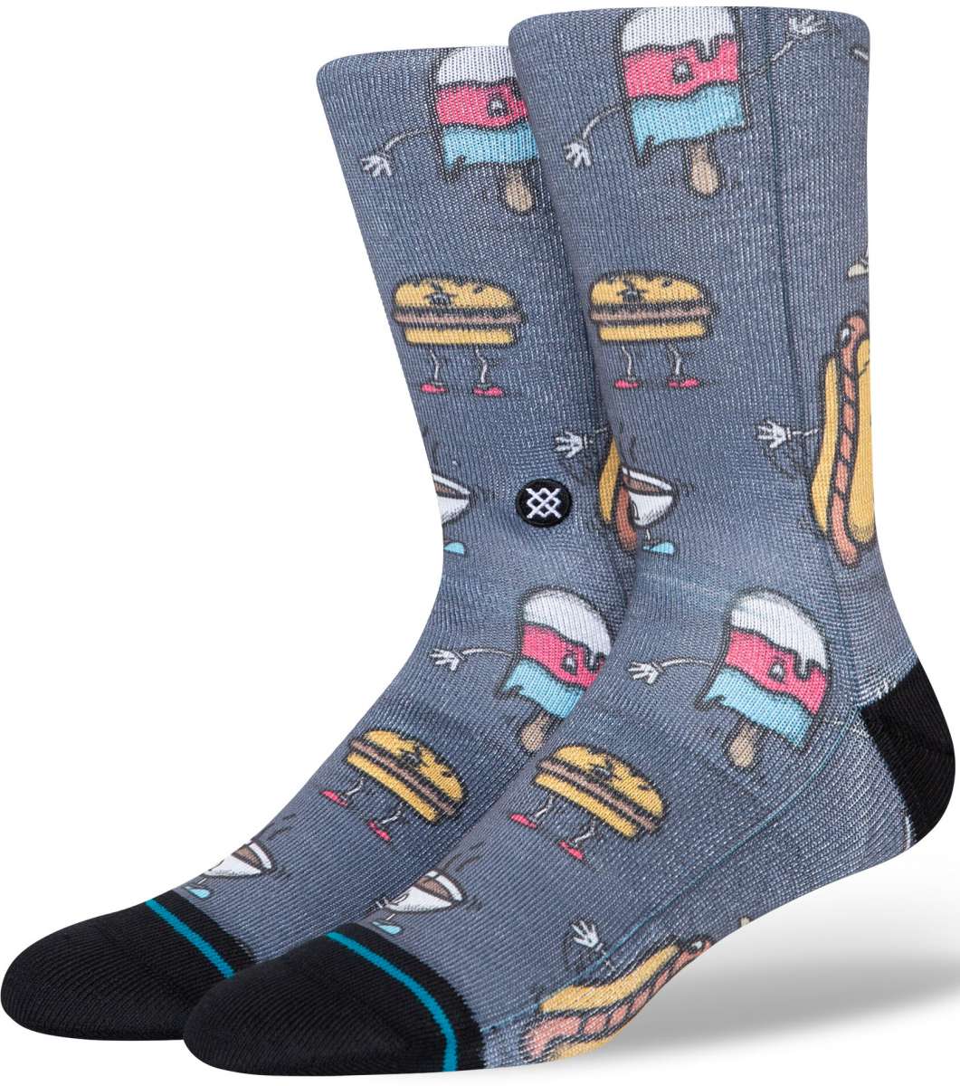 Stance - Seyclops Crew Sock 2024 is a gray crew sock with an all-over cartoon pattern of various food items, including hamburgers, hot dogs, and ice cream cones.