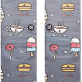 Stance Seyclops Crew Sock 2024 - A pair of gray crew socks with a repeating pattern of cartoon-style skiers and snowboarders in various poses, wearing red, white, blue, black, and yellow.