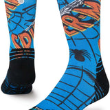 Stance Spiderman Mid Crew Sock 2024 - A pair of crew socks with a blue background and an image of Spider-Man in red and black.