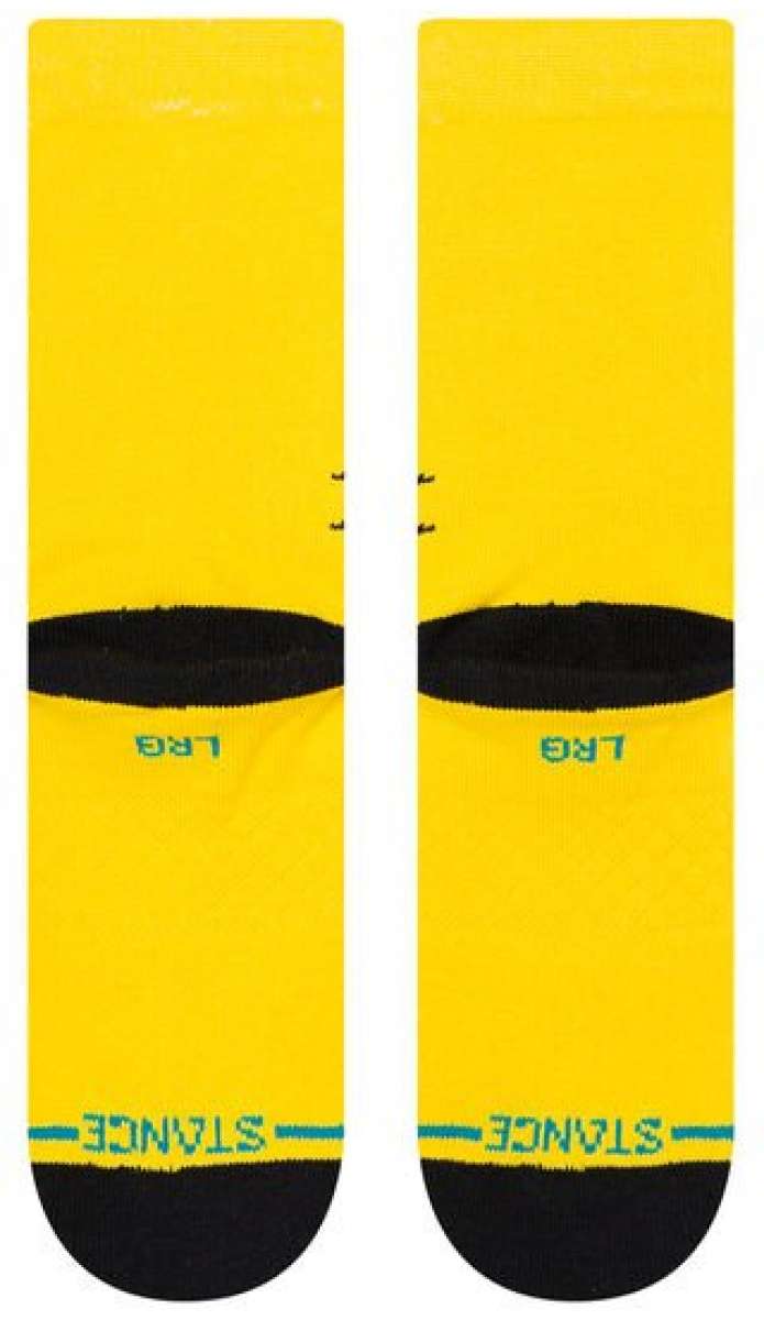 Stance Juniors Spidey Season Crew Socks 2023 - A pair of yellow crew socks with a spiderman graphic on them.