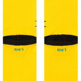 Stance Juniors Spidey Season Crew Socks 2023 - A pair of yellow crew socks with a spiderman graphic on them.