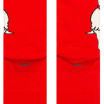 The Dog Crew Sock 2024 - A pair of red crew socks with a white cartoon dog design on the top portion.