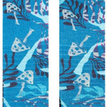 Stance Trooms Snow Sock 2024 - A pair of snow socks with a repeating pattern of white trees on a light blue background.
