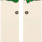 Stance Turtles Crew Sock 2024 - A pair of white crew socks with green "TURTLES" logo on top and red "TMUTANT NINJA" logo above it.