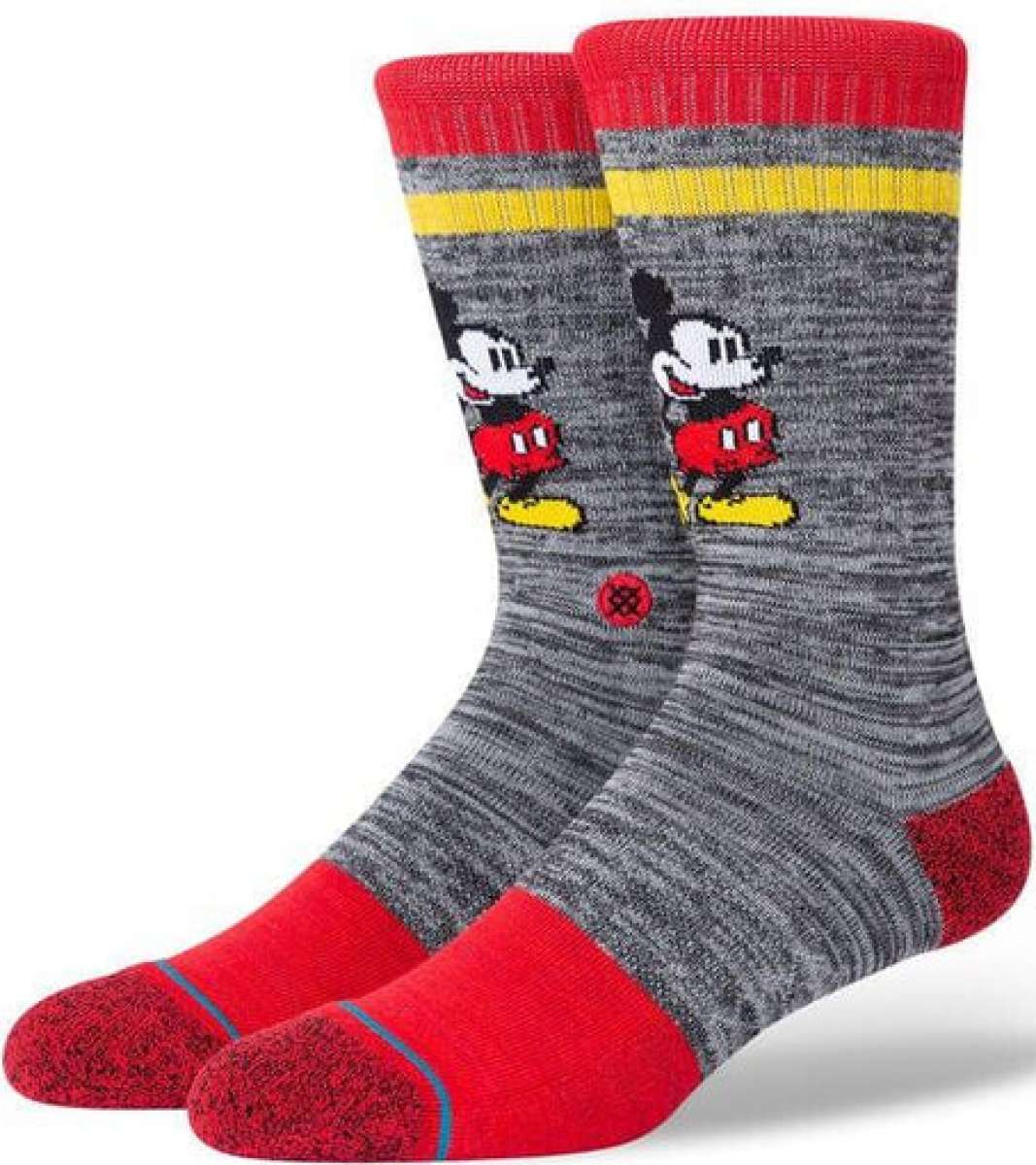 Stance Vintage Disney 2020 Crew Sock - A gray crew sock with a repeating pattern of Mickey Mouse in red shorts and yellow shoes.