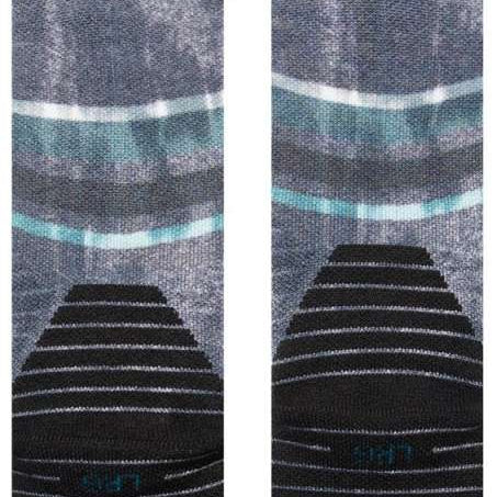 Stance - White crew socks with black snowboard-themed graphics on top, featuring a blue and white stripe at the ankle.