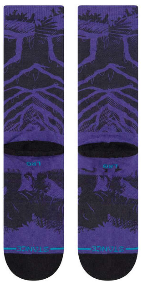 Stance Yibambe Crew Sock 2023 - A pair of crew socks with a purple background and a repeating pattern of black lines forming triangles.