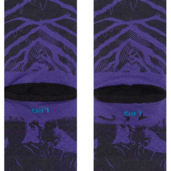Stance Yibambe Crew Sock 2023 - A pair of crew socks with a purple background and a repeating pattern of black lines forming triangles.