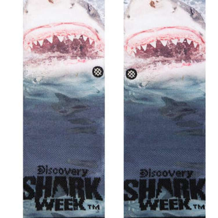 Stance Kids' Shark Week Crew Socks 2023 - A pair of crew socks with a shark design on them, featuring a large shark's head and teeth in shades of gray and white.