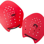 Strokemaker Swim Hand Paddles - Red paddles with white dots, featuring a textured surface and black cords at the top.