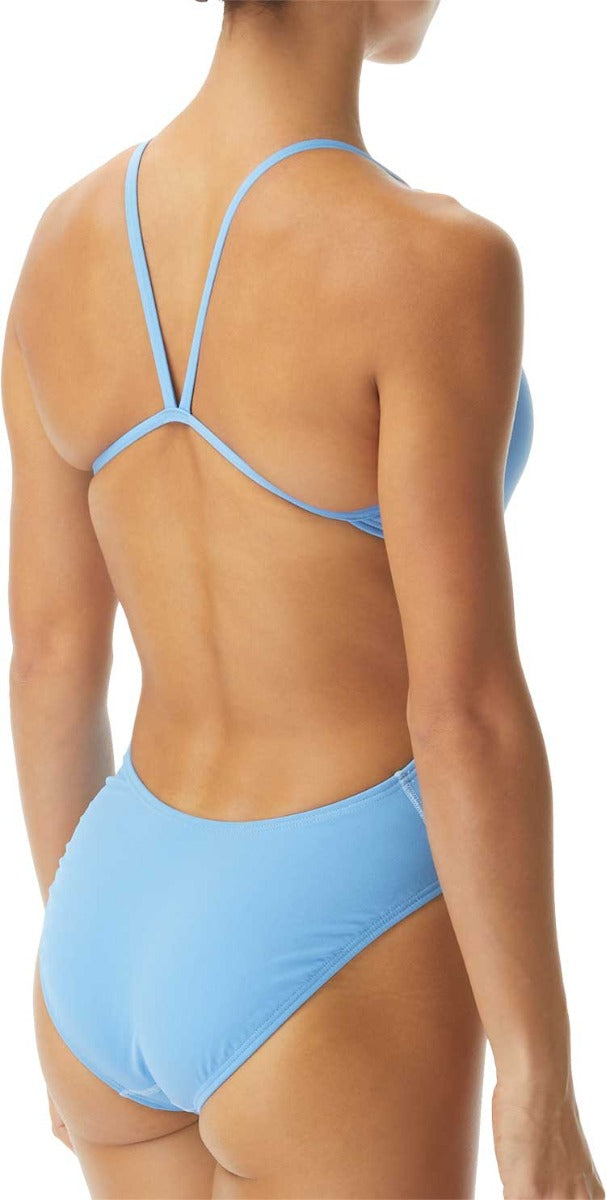 TYR Ladies' Durafast One Solids Cutoutfit Swimsuit - A light blue swimsuit with a cut-out design on the side, featuring thin straps and a high-cut leg.