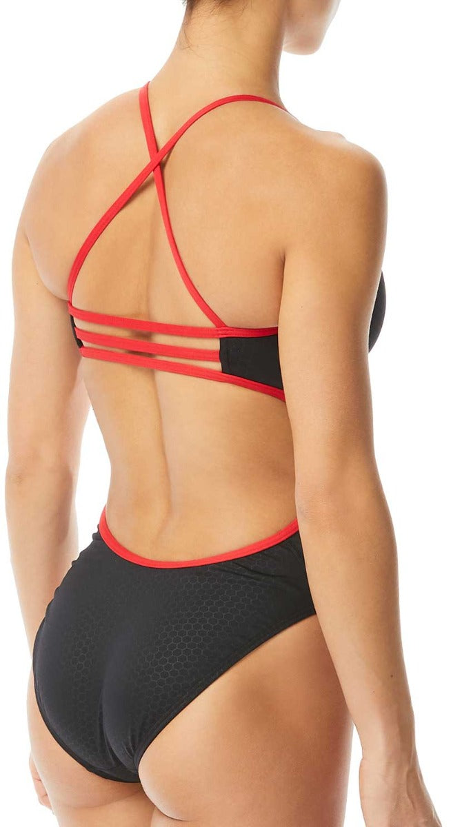 TYR Ladies' Hexa Trinityfit Swimsuit - A black swimsuit with a red trim and hexagonal pattern on the bottom portion.