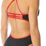 TYR Ladies' Hexa Trinityfit Swimsuit - A black swimsuit with a red trim and hexagonal pattern on the bottom portion.