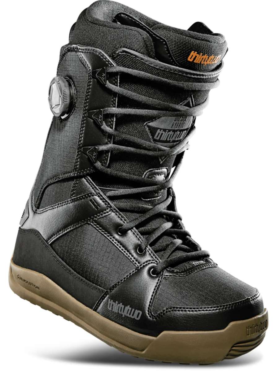 ThirtyTwo Diesel Hybrid Snowboard Boot 2024 - A black snowboard boot with a textured fabric upper and tan-colored rubber sole.