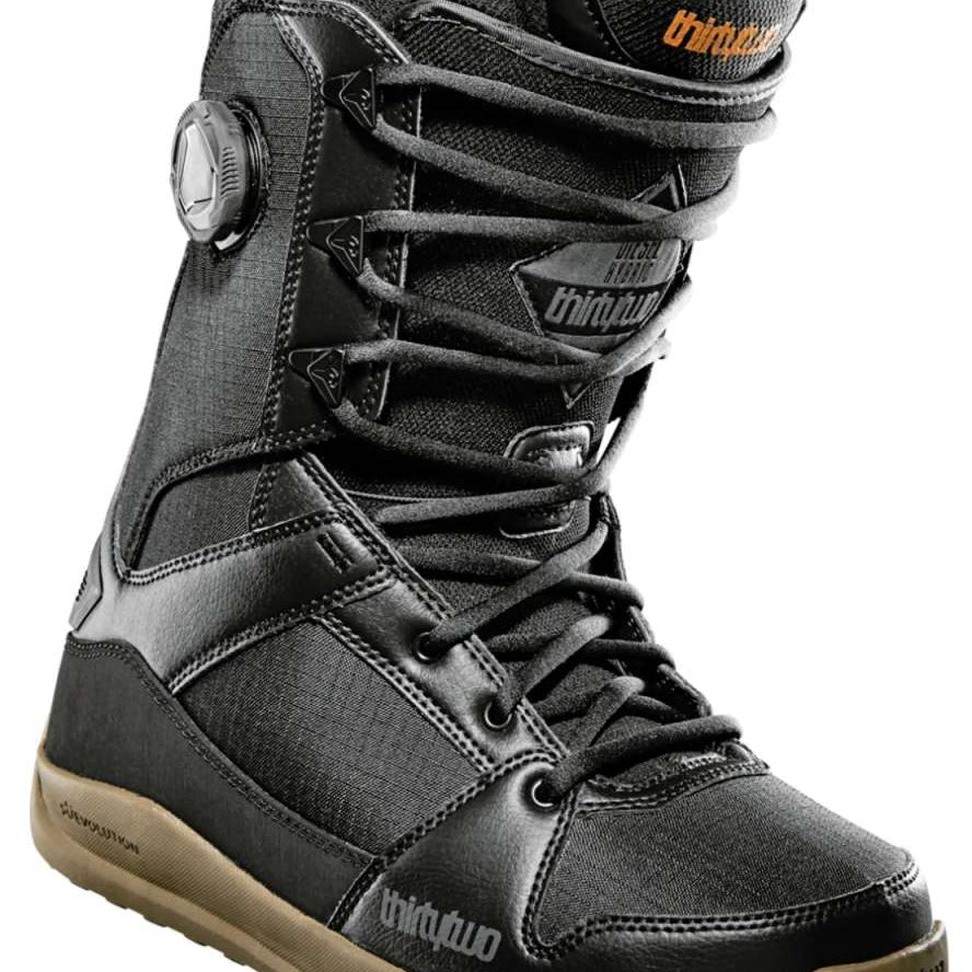ThirtyTwo Diesel Hybrid Snowboard Boot 2024 - A black snowboard boot with a textured fabric upper and tan-colored rubber sole.