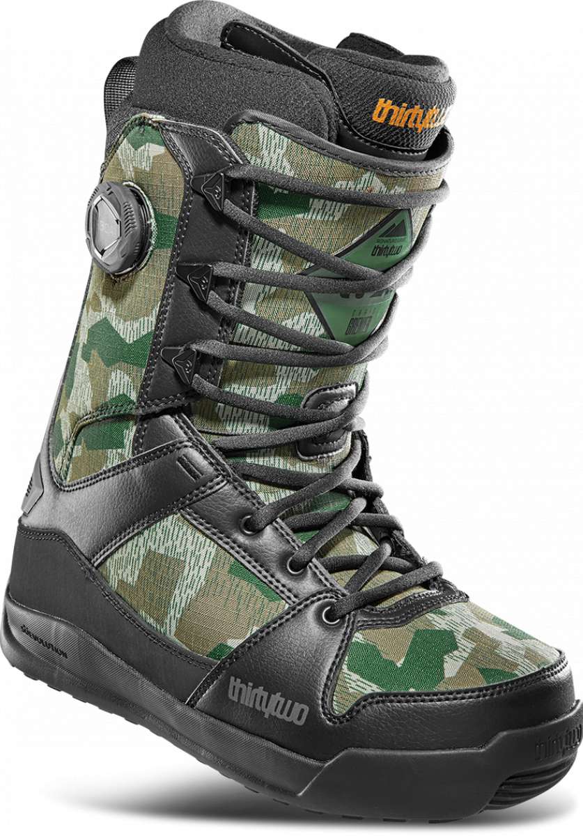 ThirtyTwo - Diesel Hybrid Snowboard Boot 2024 is shown in a green and tan camouflage pattern with black laces and buckles.