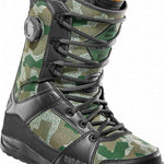 ThirtyTwo - Diesel Hybrid Snowboard Boot 2024 is shown in a green and tan camouflage pattern with black laces and buckles.