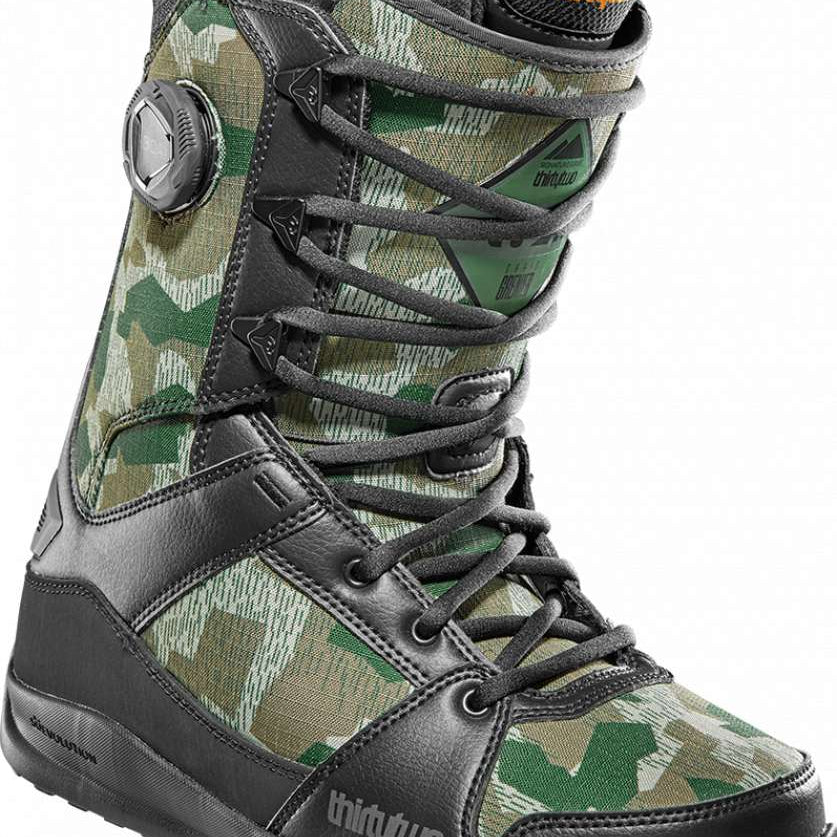 ThirtyTwo - Diesel Hybrid Snowboard Boot 2024 is shown in a green and tan camouflage pattern with black laces and buckles.