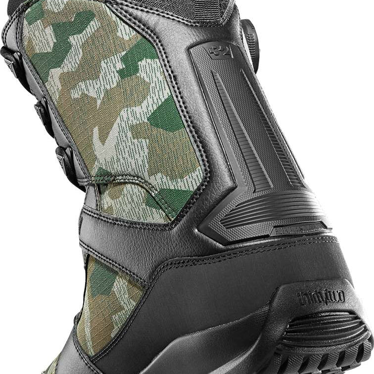 ThirtyTwo Diesel Hybrid Snowboard Boot 2024 - A camouflage-printed boot with a black sole and laces, featuring a strap on the side.