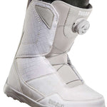 ThirtyTwo Women's Shifty BOA Snowboard Boot 2023 - A white snowboard boot with a black BOA dial on the side and a gray strap that goes across the top of the foot.