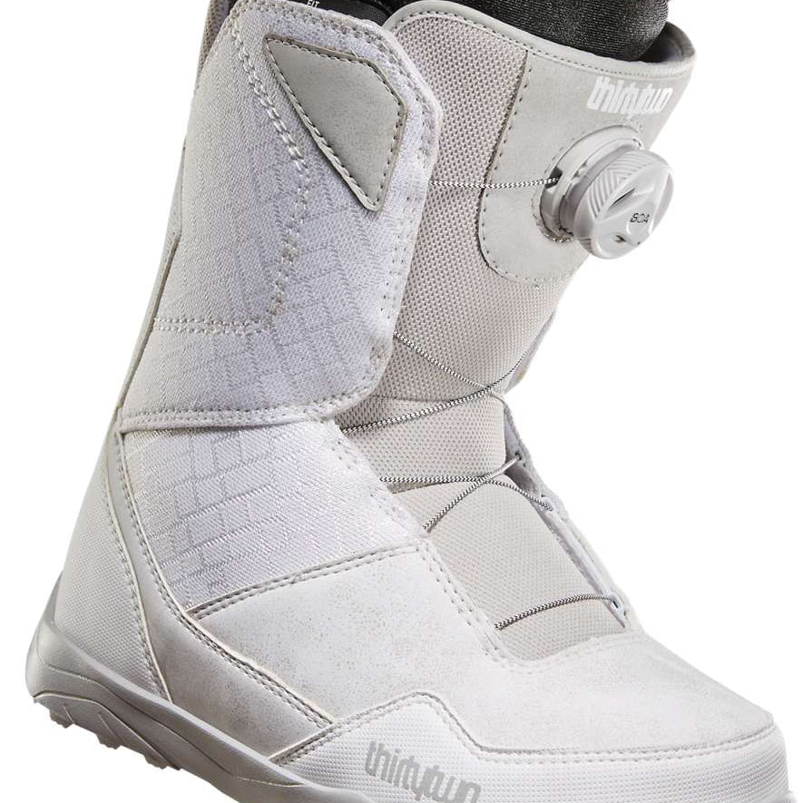 ThirtyTwo Women's Shifty BOA Snowboard Boot 2023 - A white snowboard boot with a black BOA dial on the side and a gray strap that goes across the top of the foot.