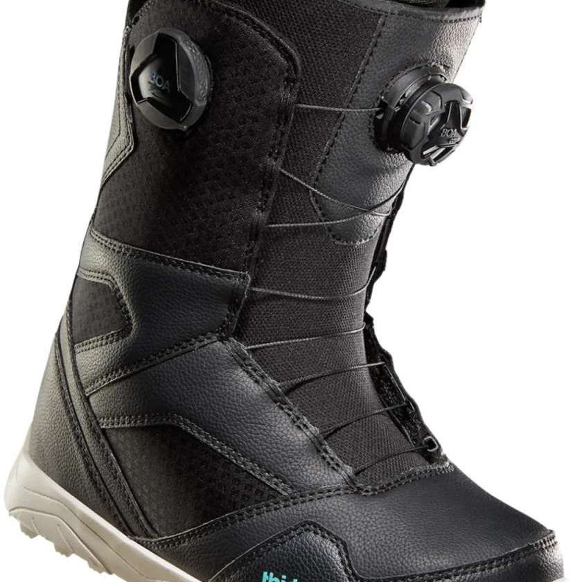 ThirtyTwo Women's STW Double BOA Snowboard Boot 2024 - Black snowboard boots with a textured pattern on the toe and heel areas, featuring two black BOA dials.